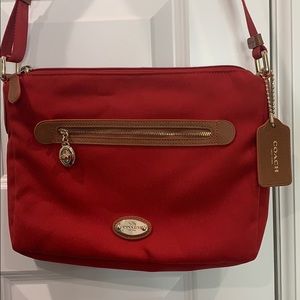 COACH Sawyer Canvas Travel Crossbody in Red
